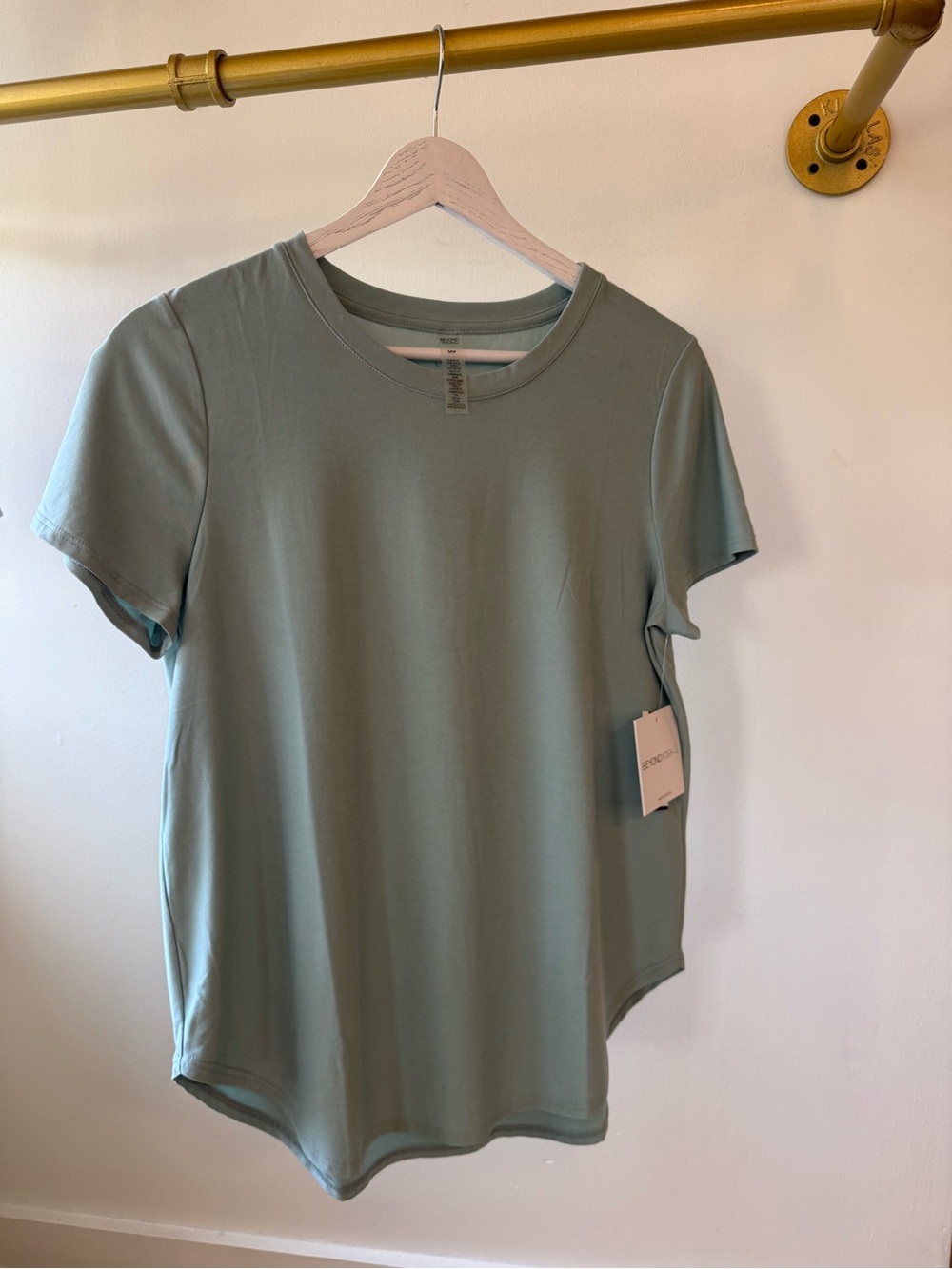 Beyond Yoga Featherweight On the Down Low Tee in Sage Green
